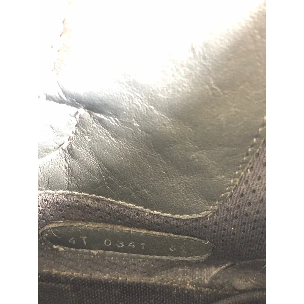Prada estimated by scuffs